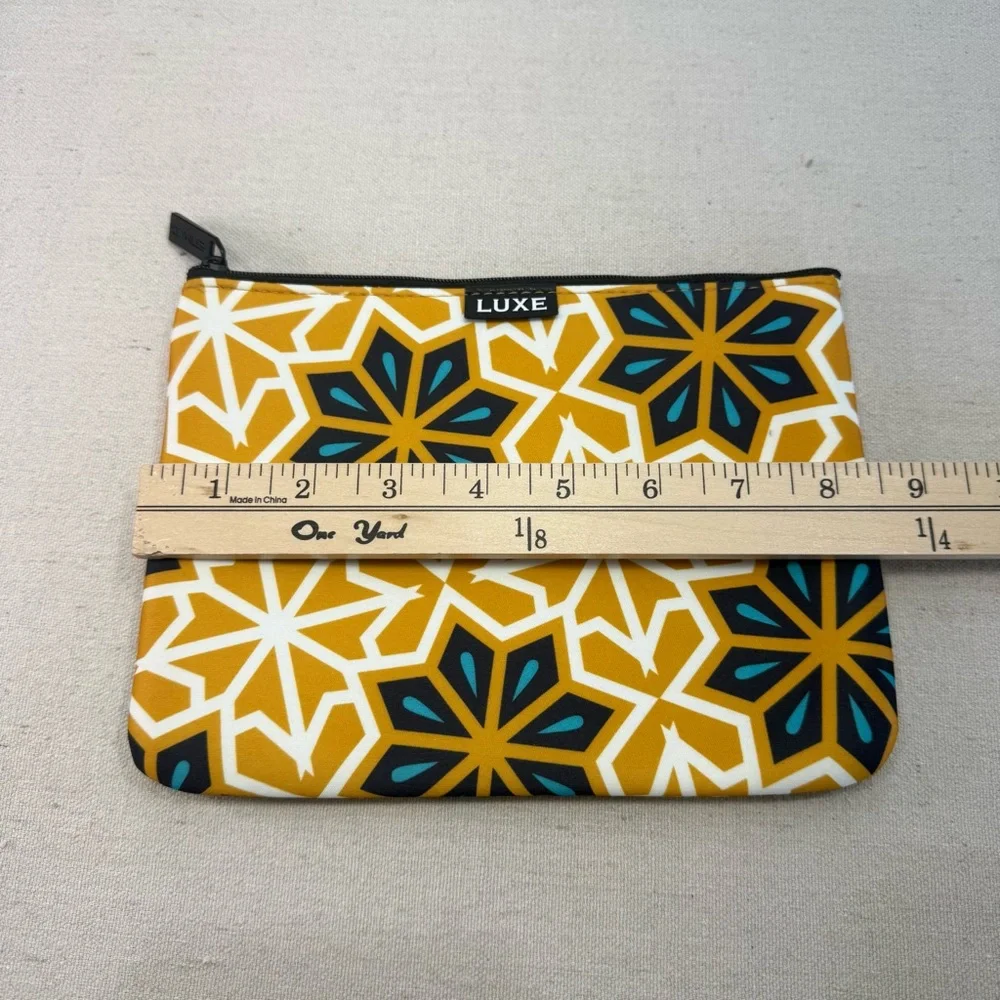 Etihad Airways Amenity Kit Bags designed in collaboration with LUXE City Guides